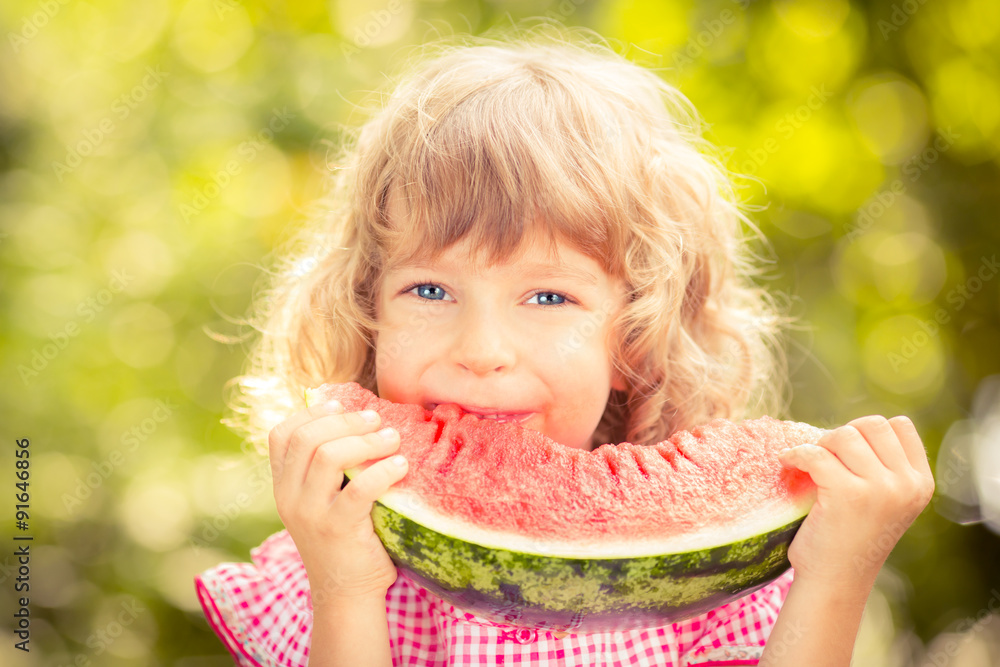 Child eating watermelon