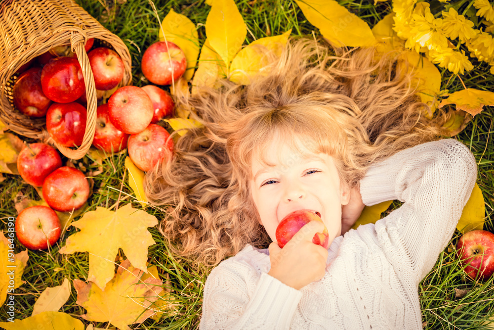 Child in autumn park