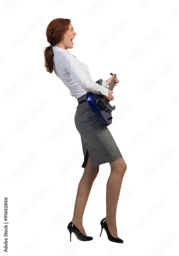 Businesswoman with guitar