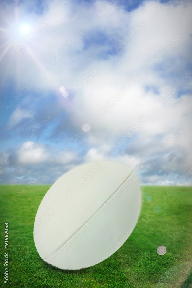 Composite image of close-up of rugby ball