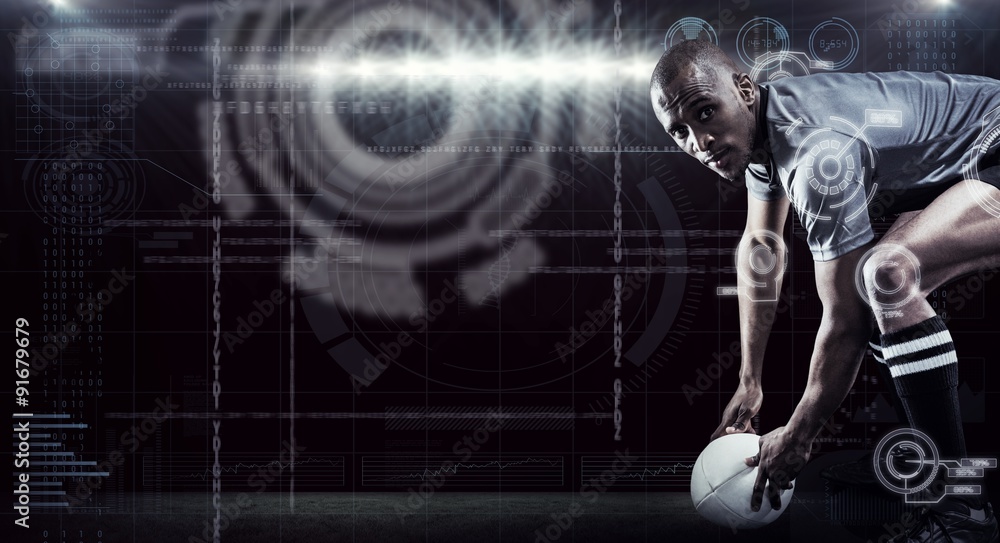 Composite image of portrait of rugby player holding ball