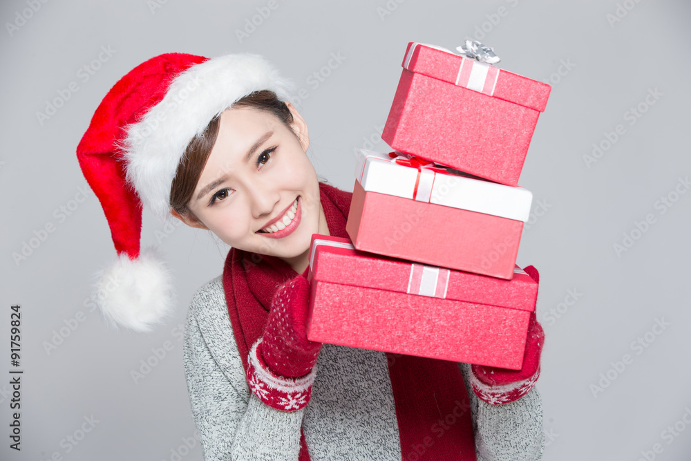 Woman shows a christmas gift