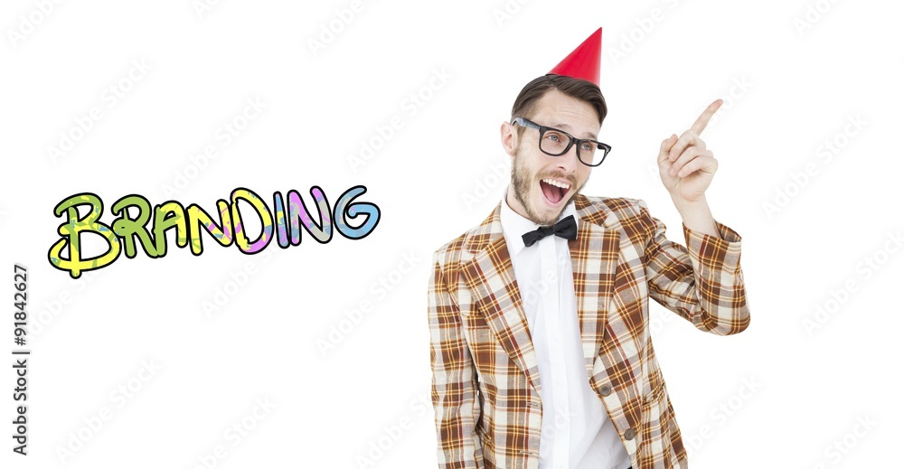 Composite image of geeky hipster in party hat pointing