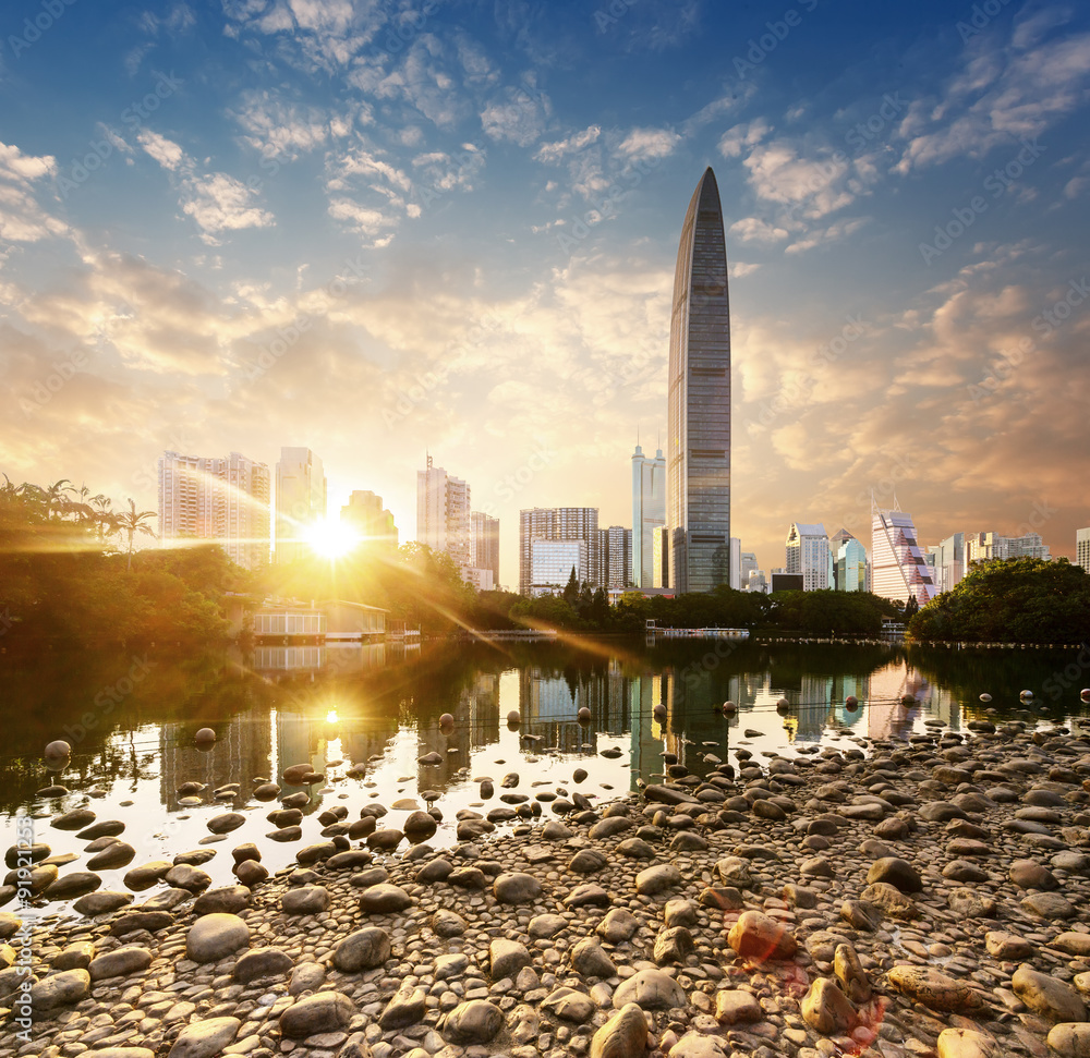 a brook besides skyscrapers