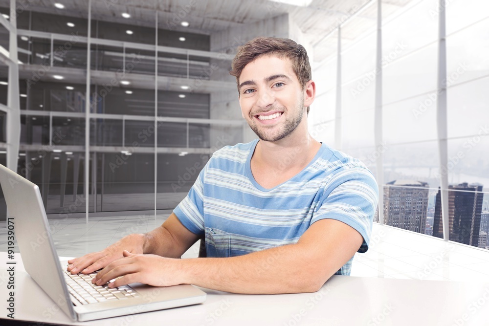 Composite image of student on laptop