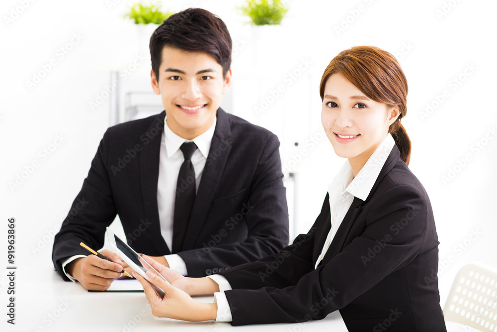 happy business man and woman working  in office