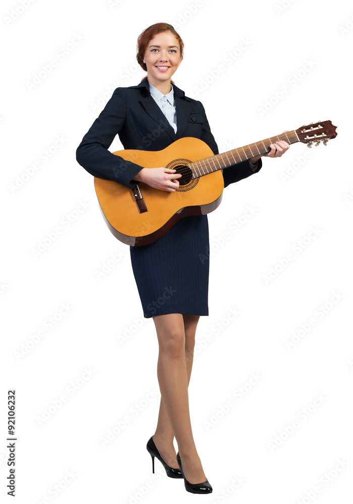 Businesswoman with guitar