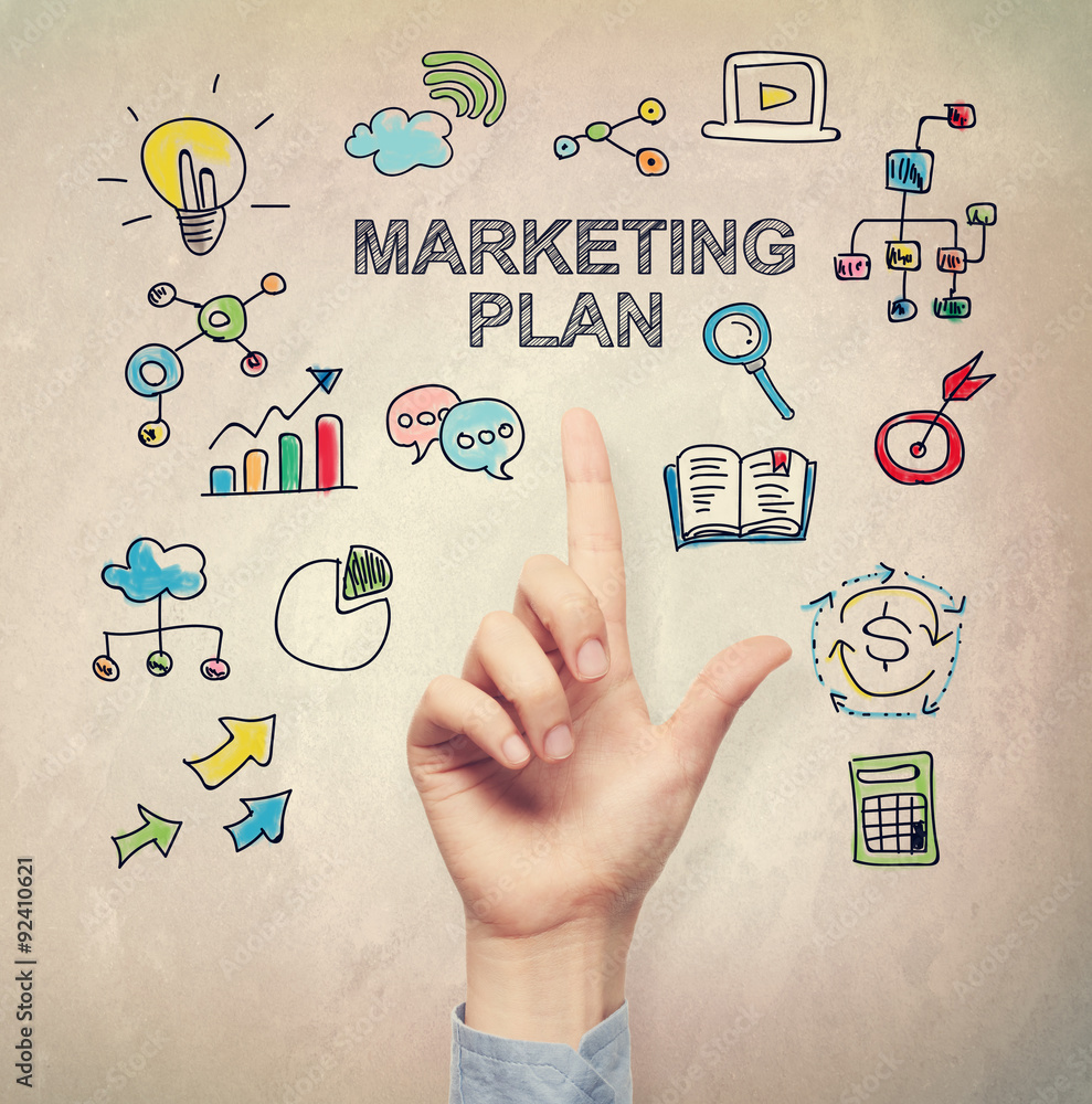 Hand pointing to Marketing Plan concept