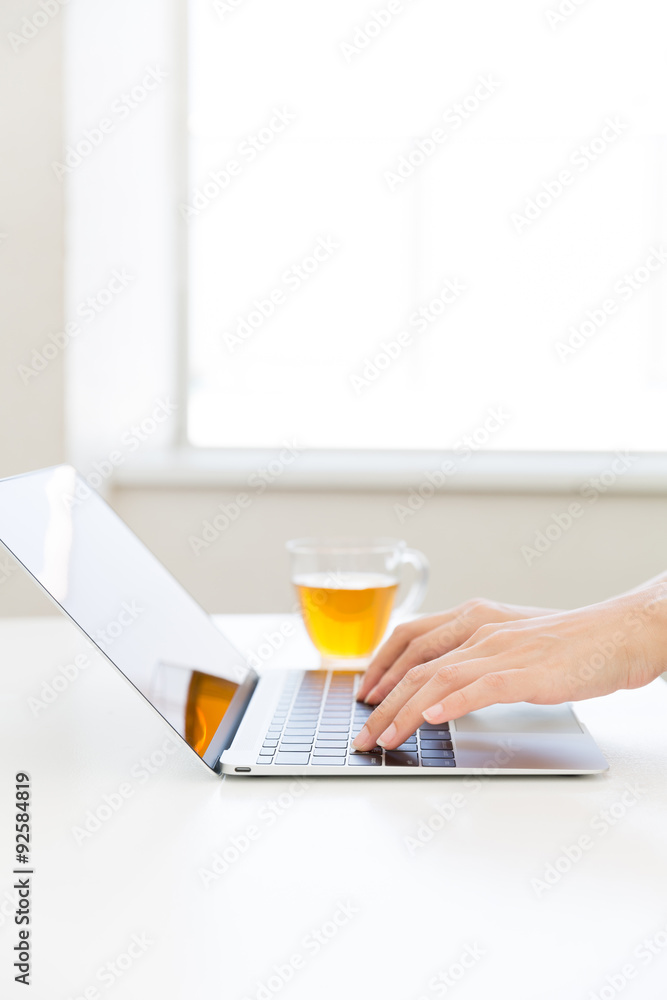 a woman using laptop computer