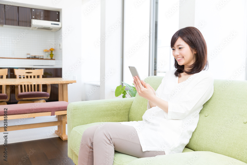 young asian woman using smart phone