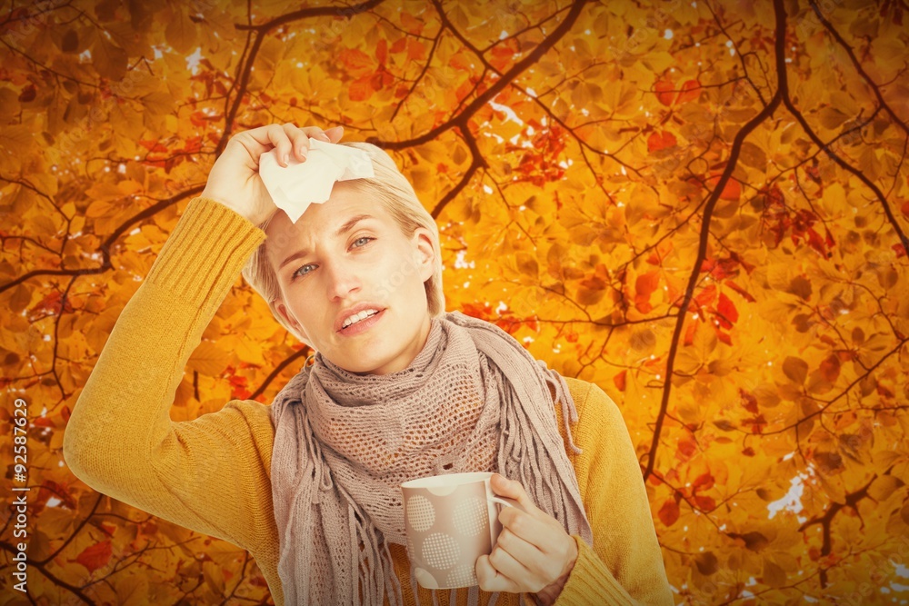 Composite image of close up of woman feeling her forehead