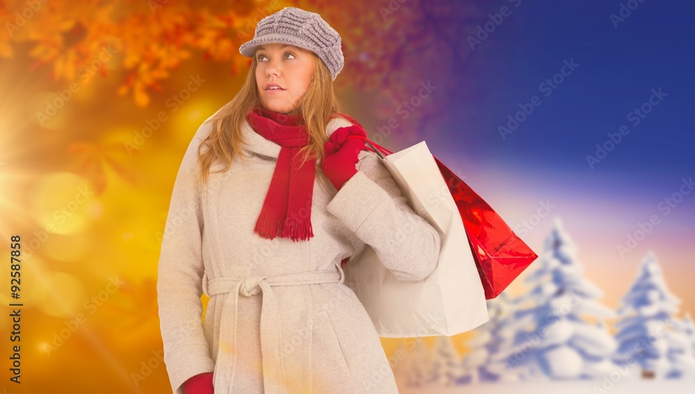 Composite image of happy blonde in winter clothes posing