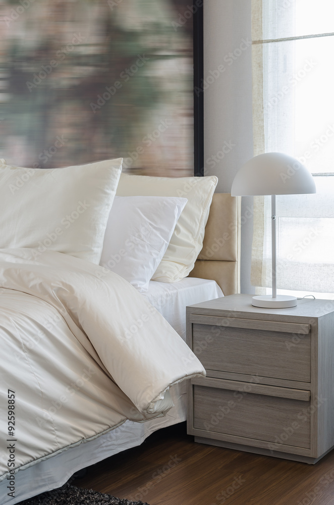 modern white lamp on wooden table side