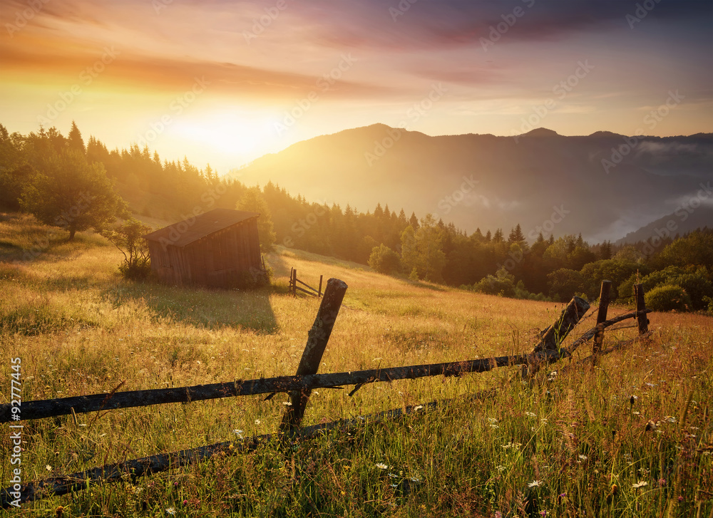 Sun beam in mountain valley in the morning time during sunrise. Natural summer landscape