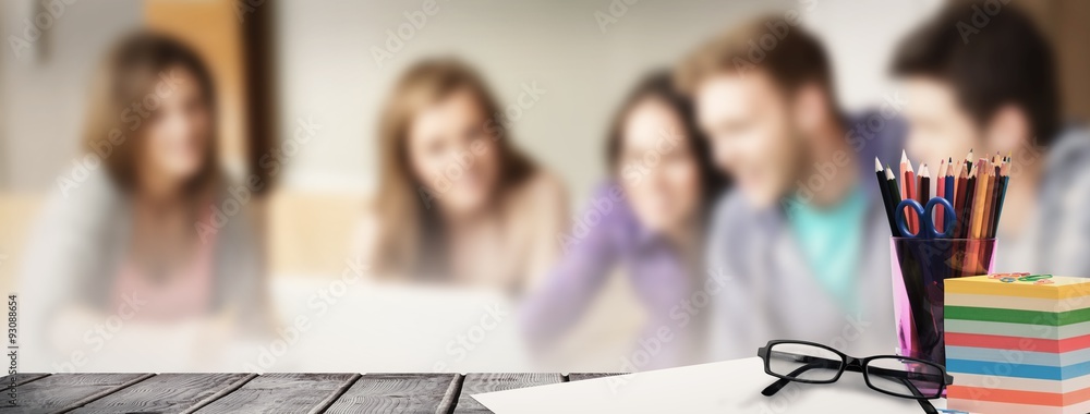 Composite image of school supplies on desk