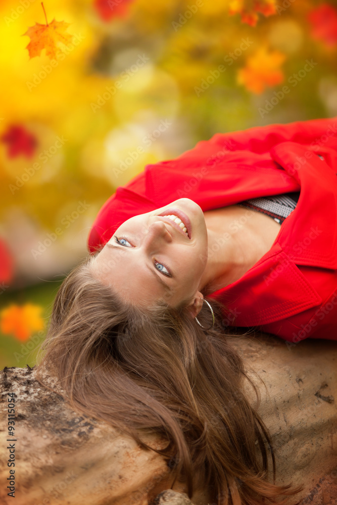 Young woman in autumn forest