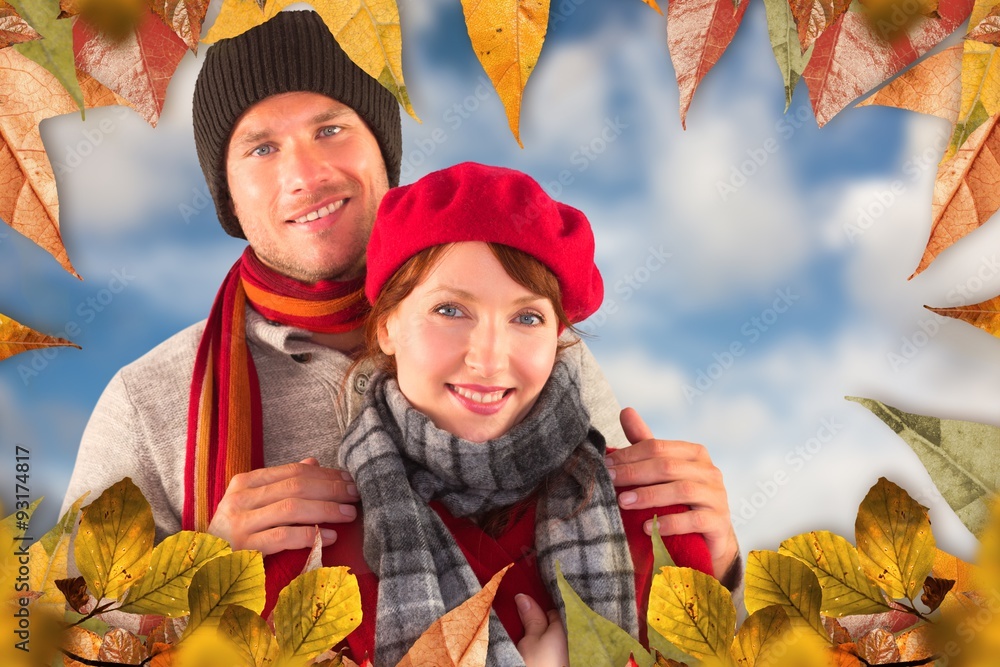 Composite image of couple smiling at the camera