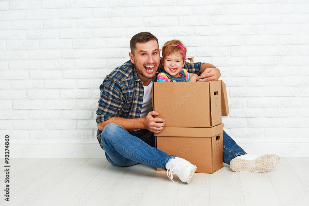 happy family moves to new apartment.