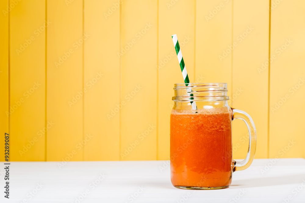 Carrot juice in masons jar