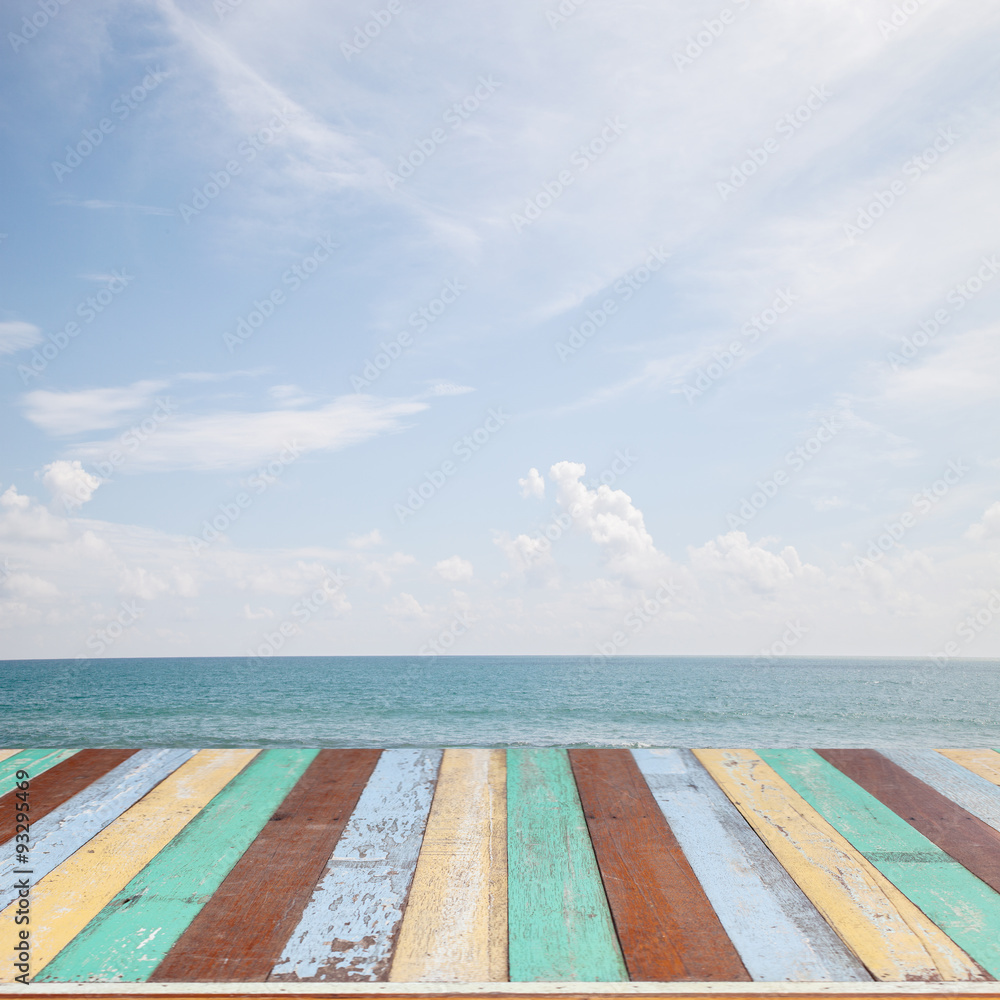 wooden floor with beautiful blue sky scenery for background.