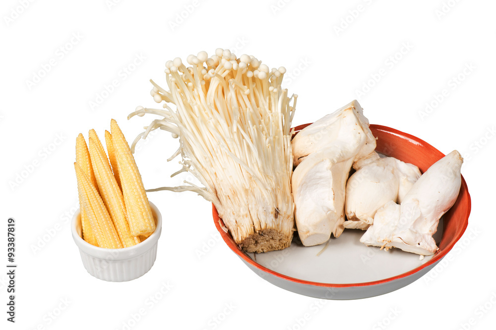 baby corn,king trumpet mushroom,needle 

mushroom in plates on white background
