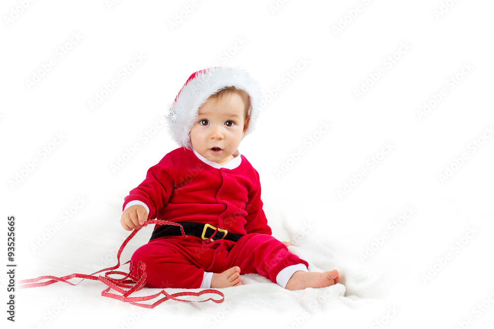 Baby isolated on white background in santa costume