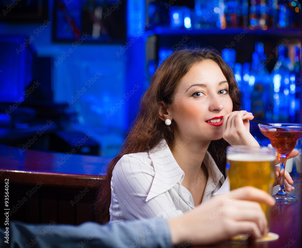 young woman in a bar