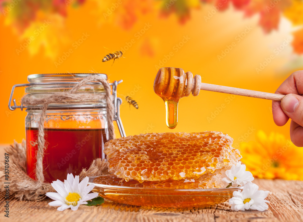 Fresh honey with dipper