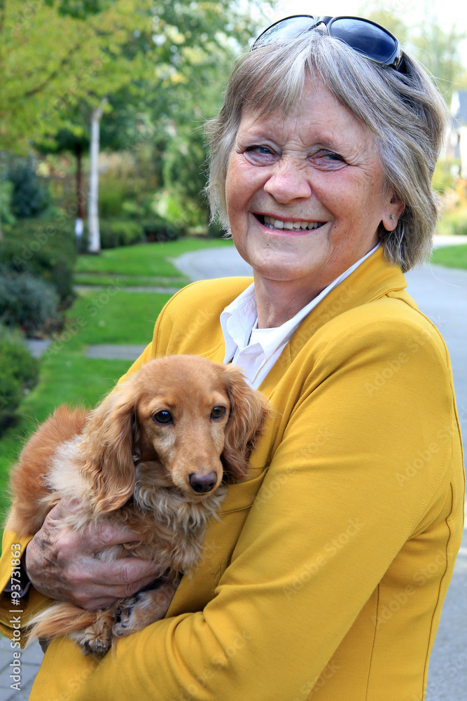 Senior lady and her dog.