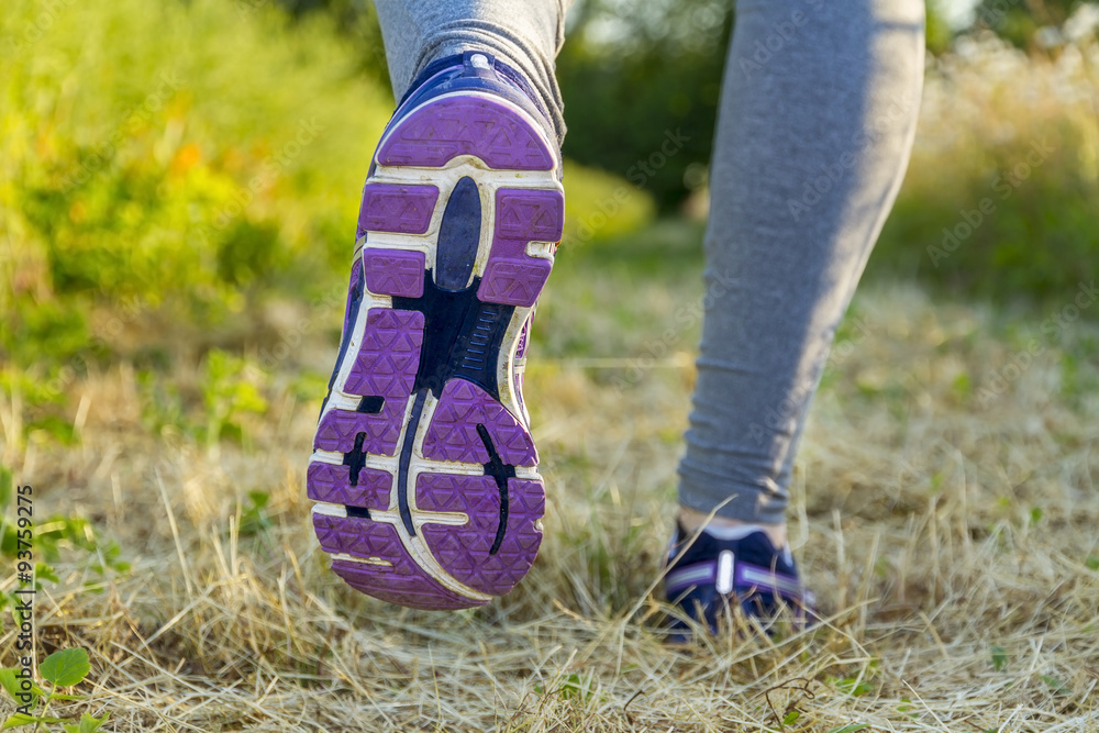 Woman running in a field