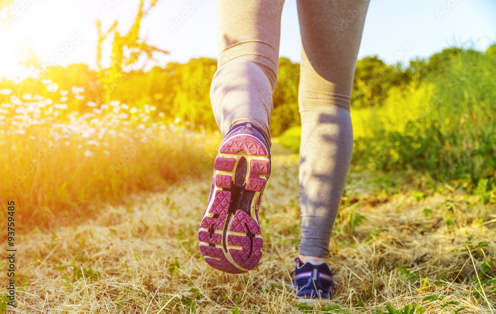 Woman running in a field