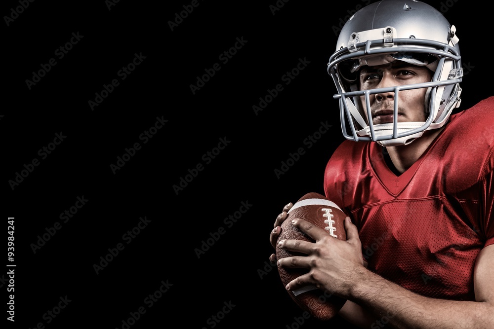 Composite image of american football player looking away