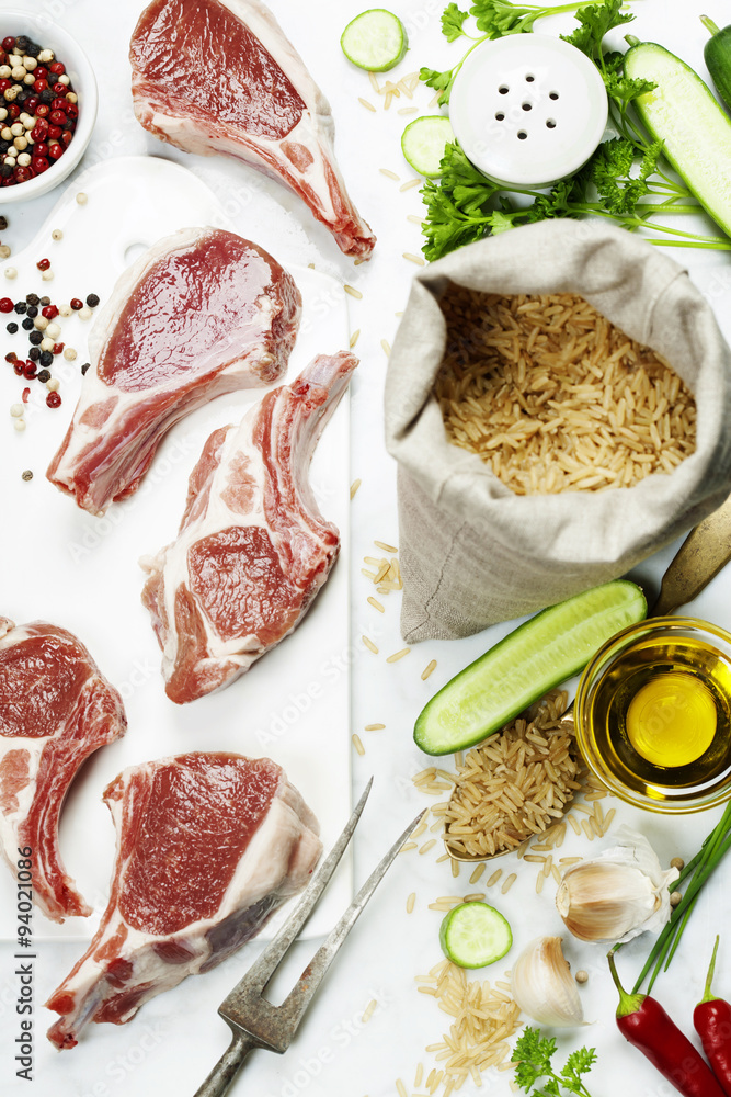 Raw lamb chops and Brown Rice