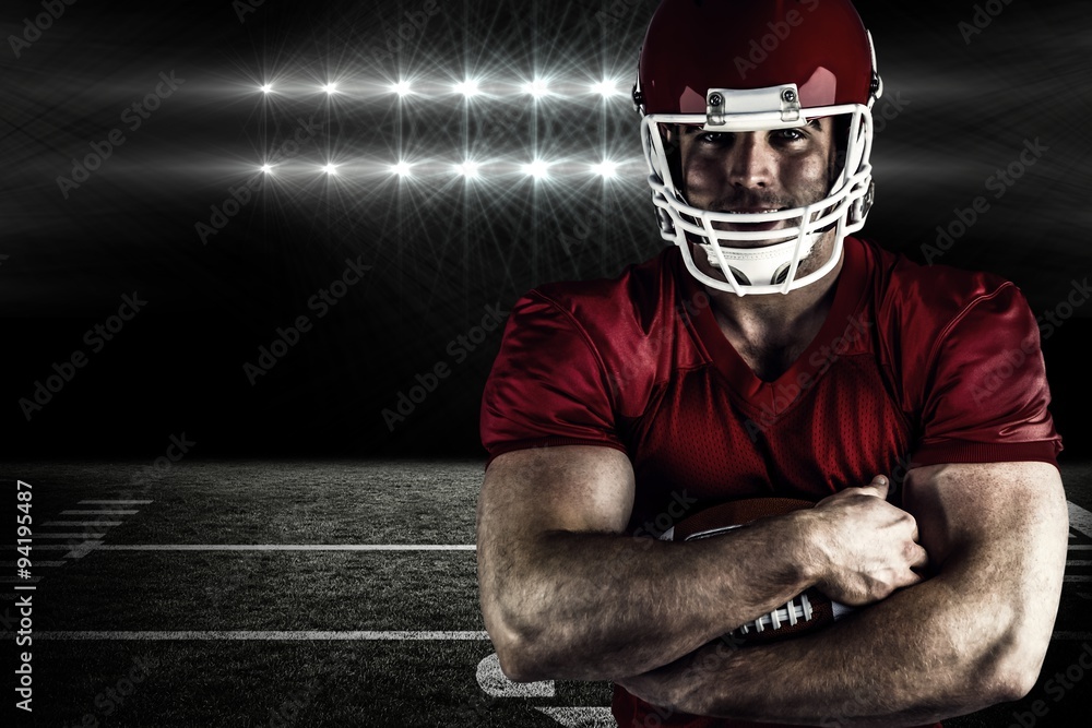 Composite image of american football player with ball