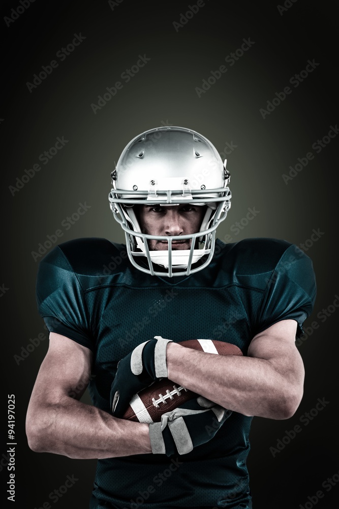 Composite image of portrait of confident sportsman holding ball