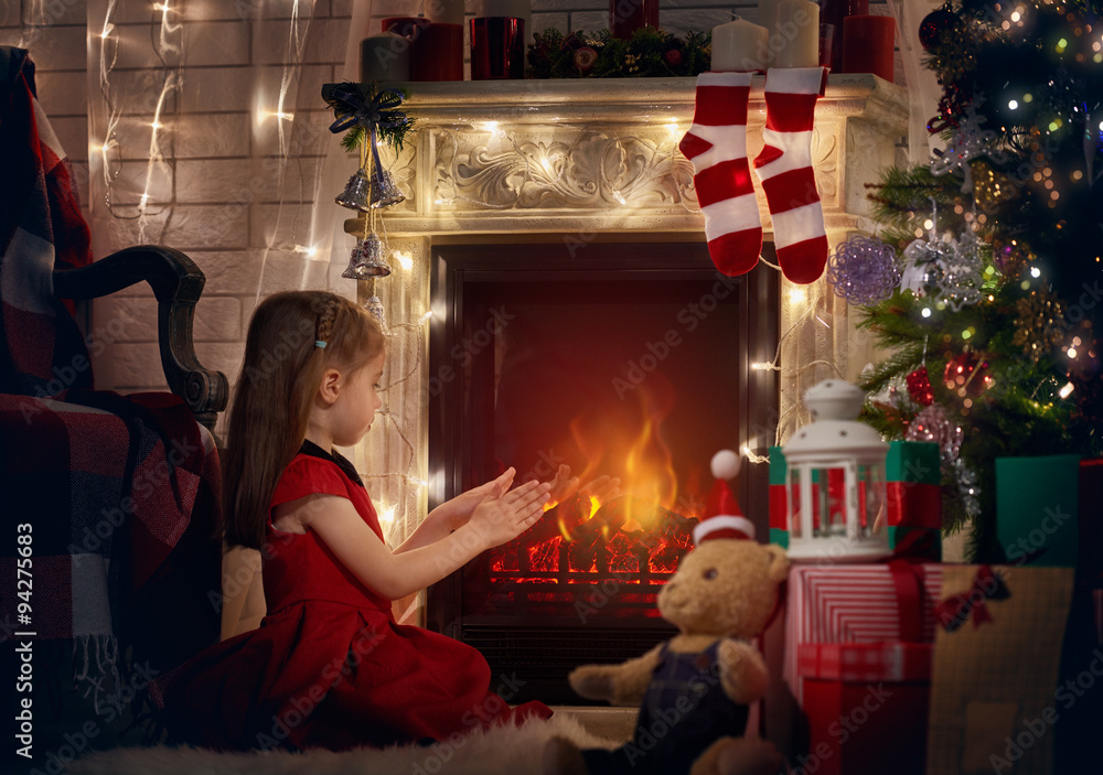 girl by fireplace