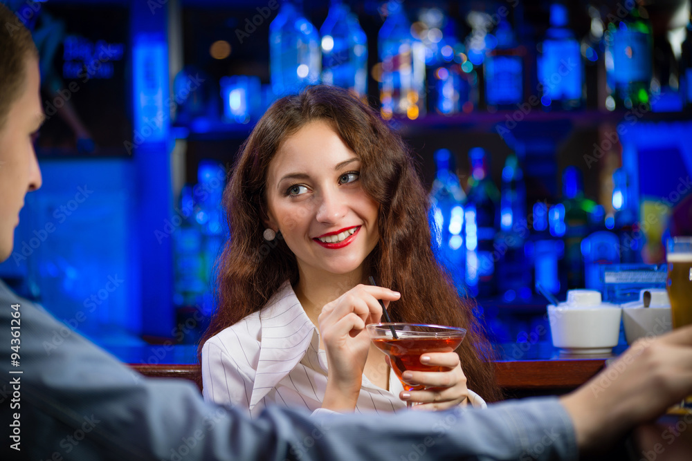 young woman in a bar