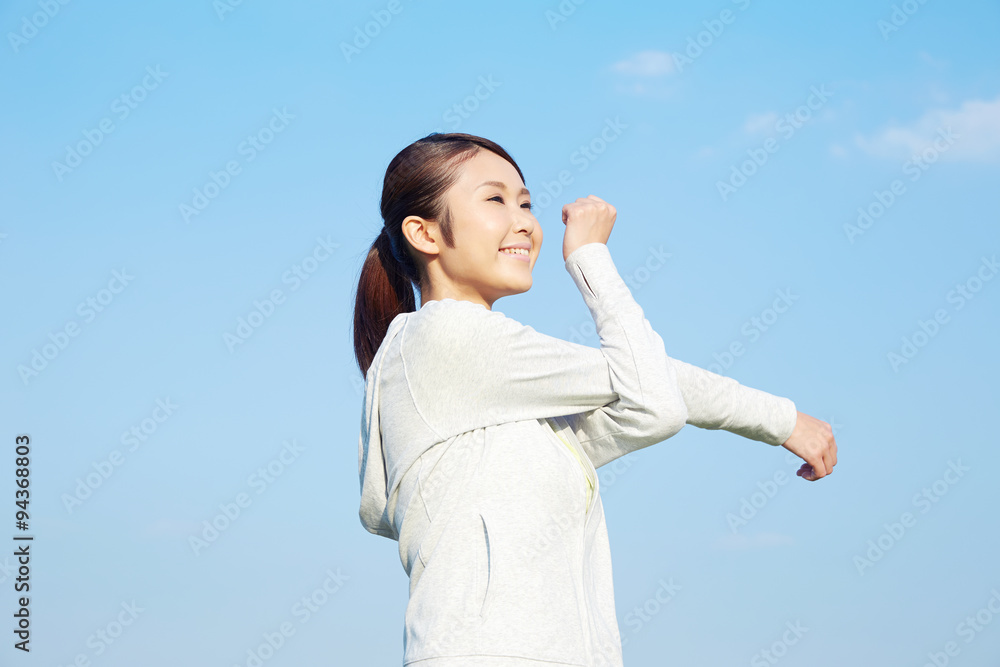 準備運動する女性