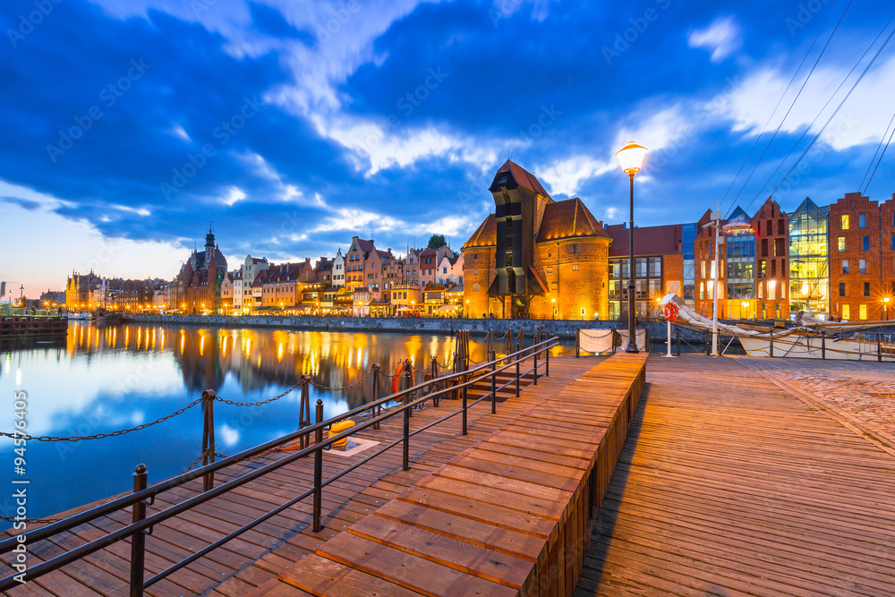 Old town of Gdansk with ancient crane at dusk, Poland