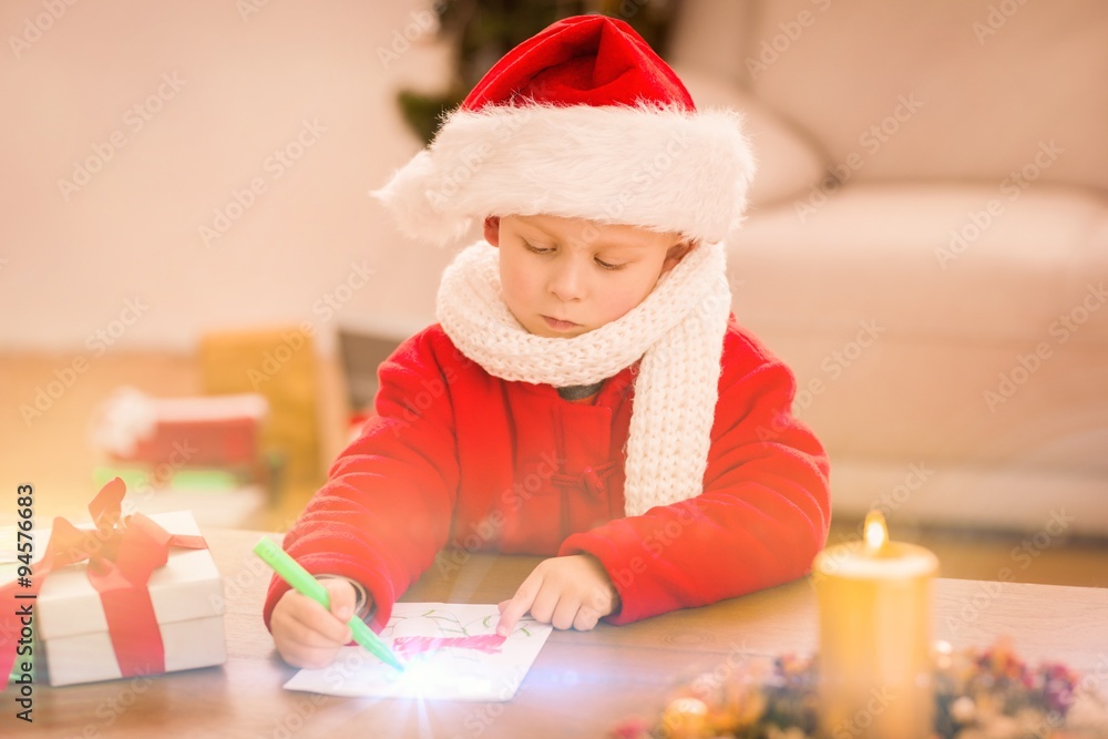 Festive little boy drawing pictures