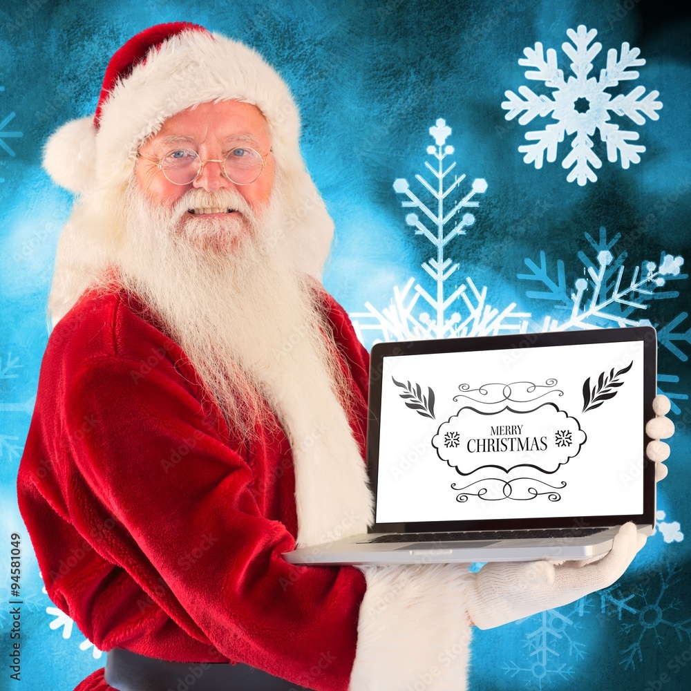 Composite image of santa claus presents a laptop