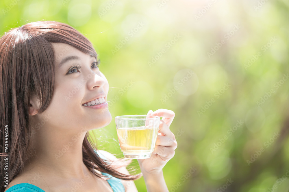 Young Woman drinking hot tea