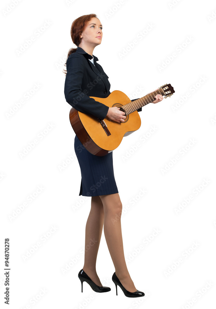 Businesswoman with guitar