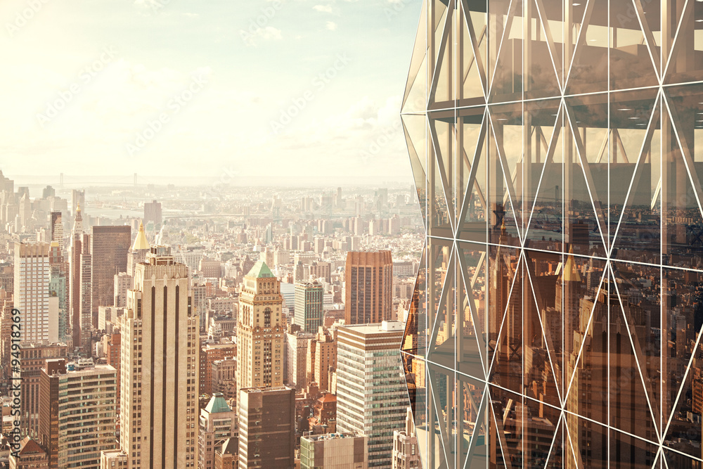 Modern vitreous skyscraper with city view background