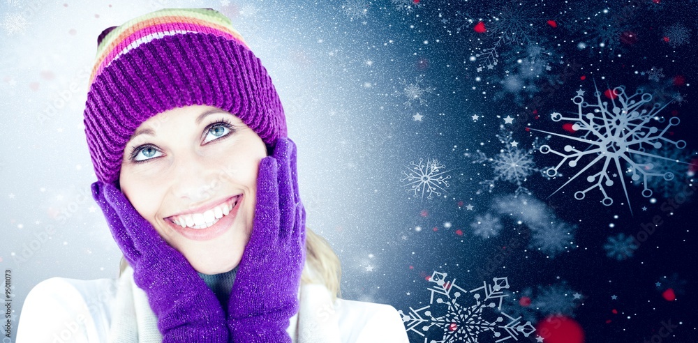 Composite image of cheerful woman with warm clothes