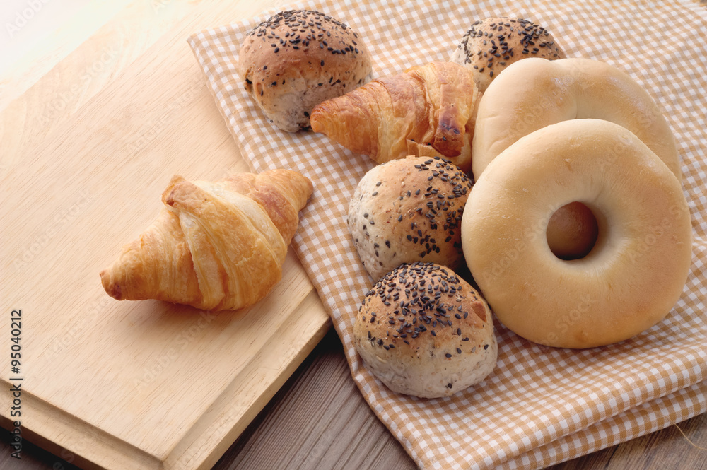 mix bread on fabric and wooden board