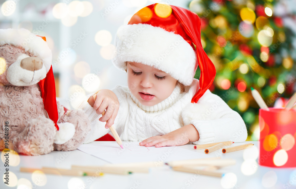 child before Christmas writes a letter to Santa