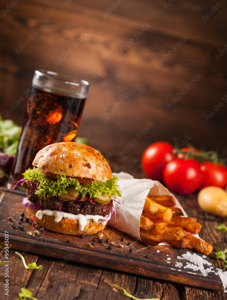 Delicious hamburger on wood