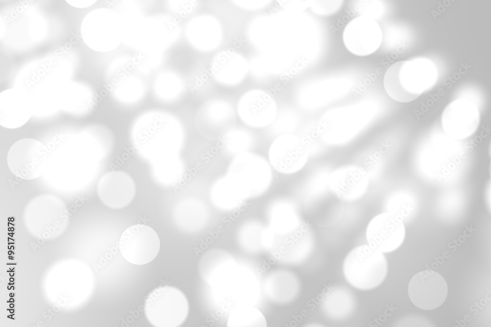 Light circles on grey background