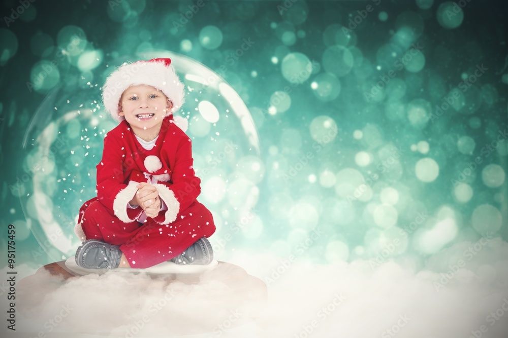 Composite image of festive child in snow globe